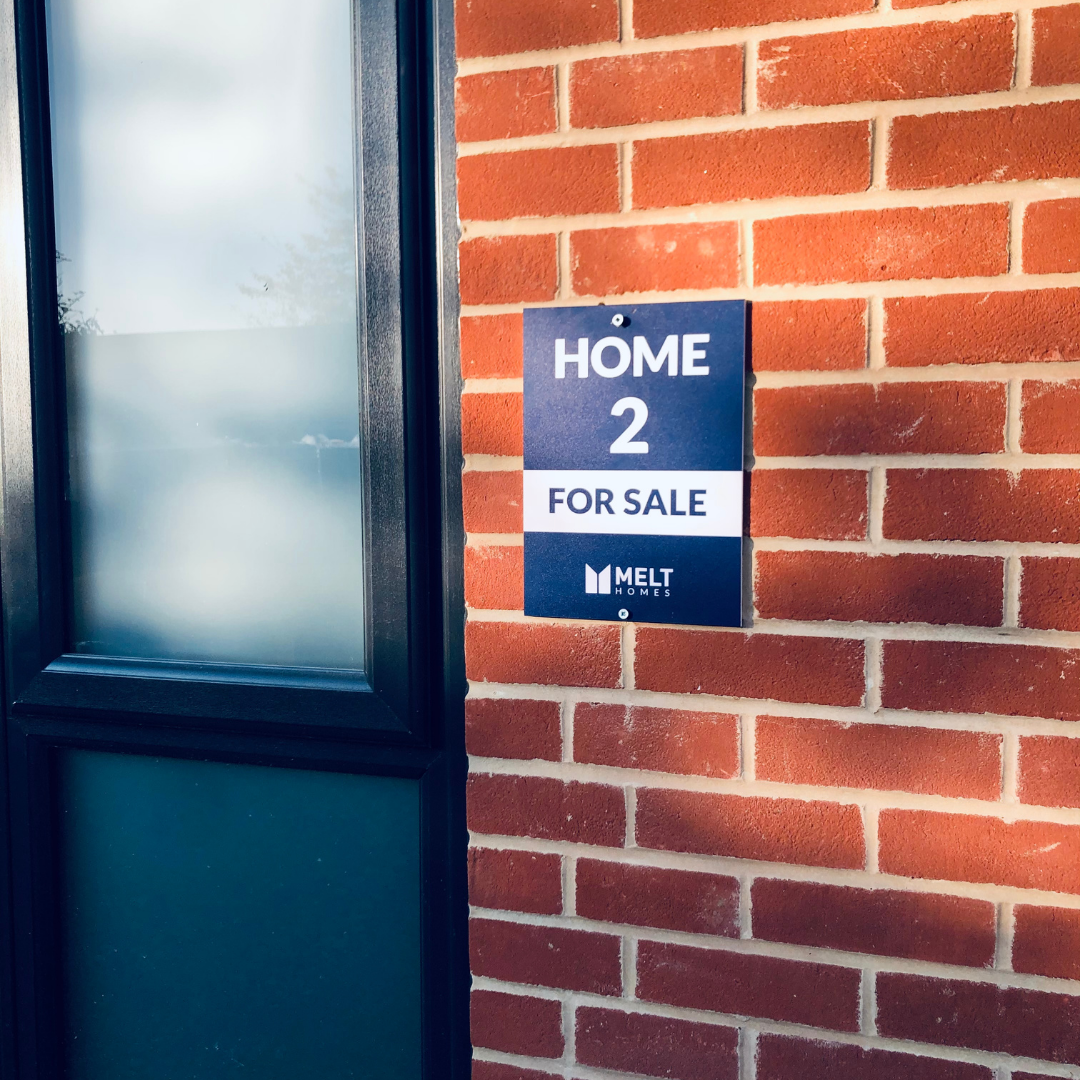 Home for sale sign
